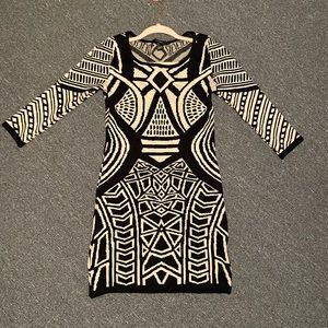 Black and cream fitted sweater dress